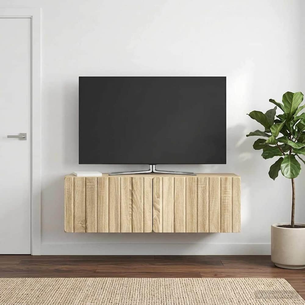 vidaXL Wall-Mounted TV Cabinet 98 x 31 x 30 cm Sonoma Oak mounted on a wall above a rug with a TV on top