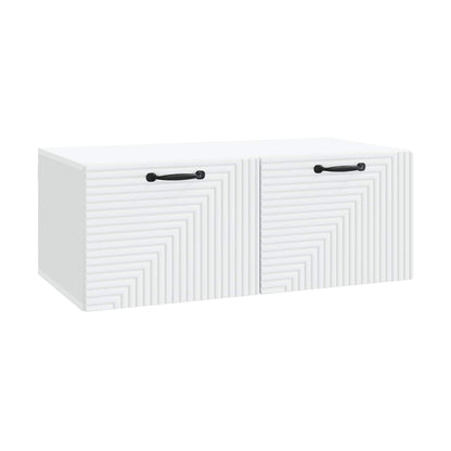 White engineered wood TV cabinet with textured doors and black handles