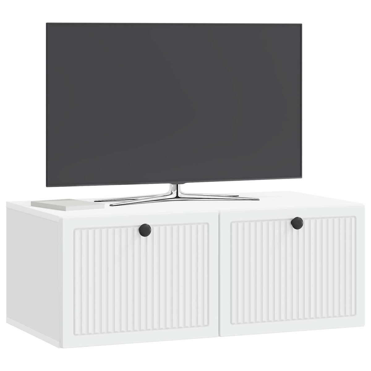 The wall cabinet supporting a flat screen television on its top surface