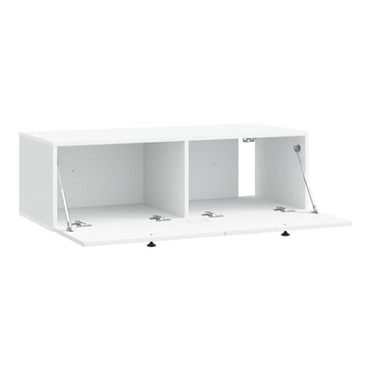 The white TV cabinet with its doors open showing two storage compartments