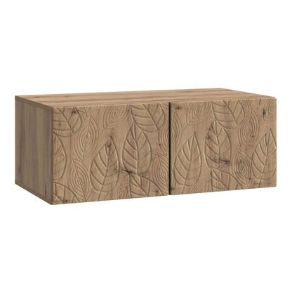 The wall-mounted TV cabinet featuring two doors with a carved leaf pattern