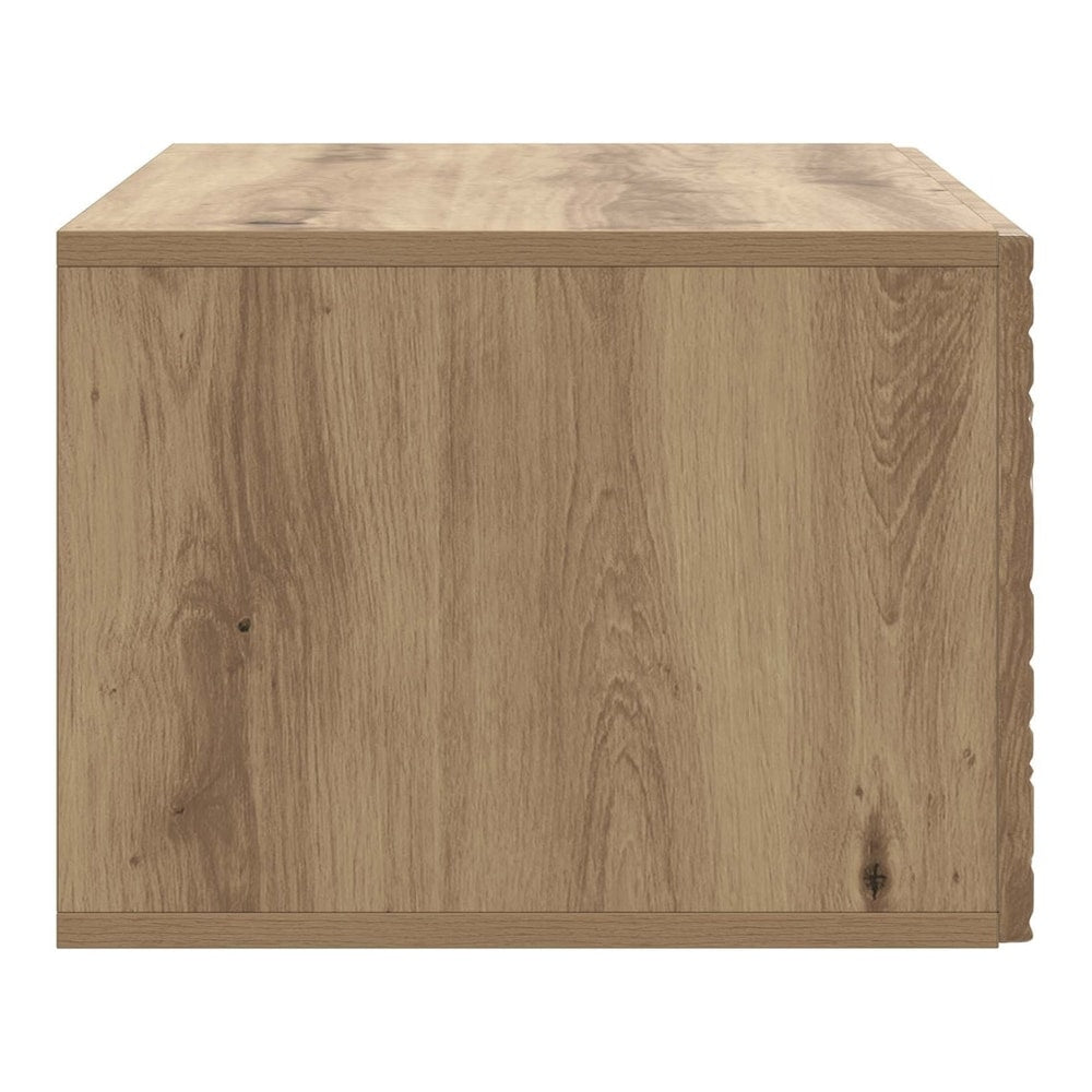 The side panel of the TV cabinet showing the wood grain finish