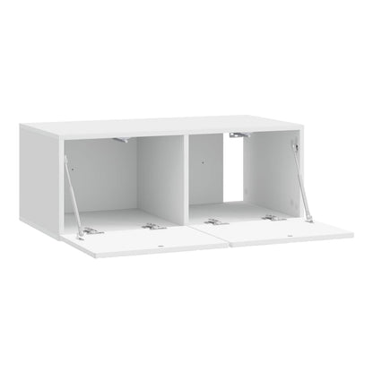 The white wall-mounted TV cabinet with both doors open showing storage space