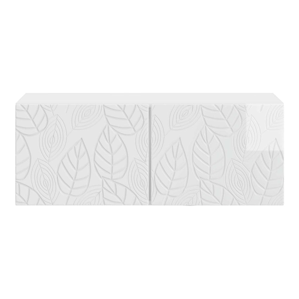 The white TV cabinet has a textured front with a leaf pattern