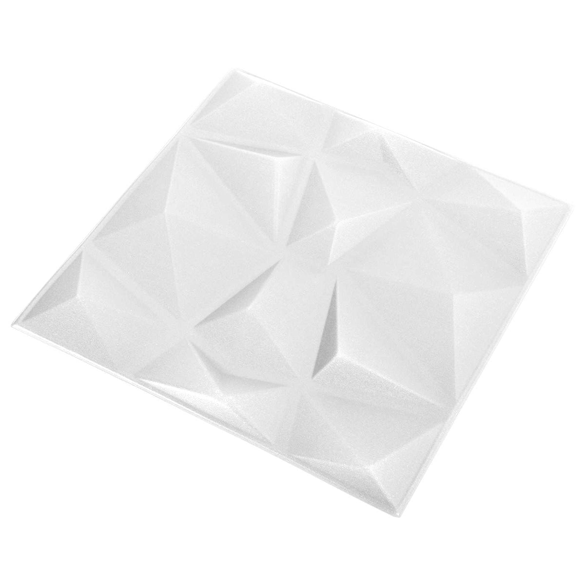 Close-up of a single white geometric wall panel with a faceted diamond design