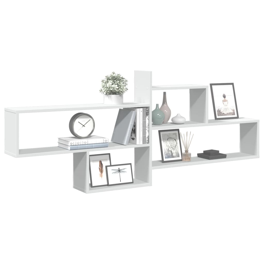 the white wall shelf unit with decorative items