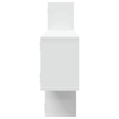 the white wall shelf unit from the side