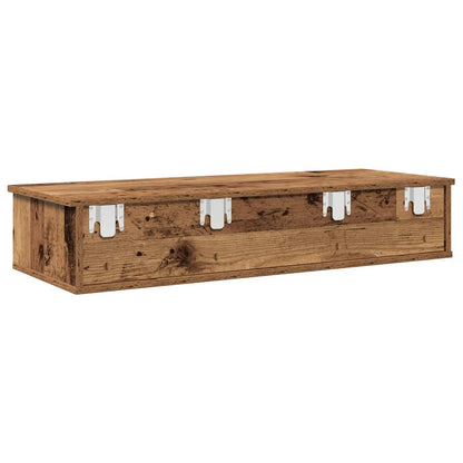 The back of the wooden wall shelf with mounting brackets visible