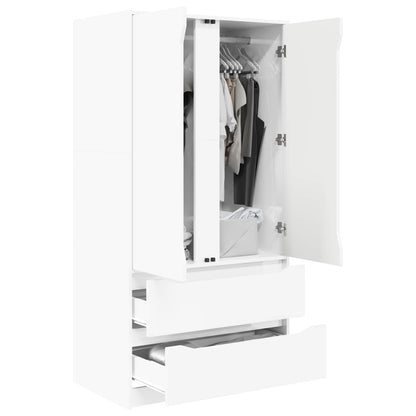 The white high gloss wardrobe with doors and drawers open, showing storage space