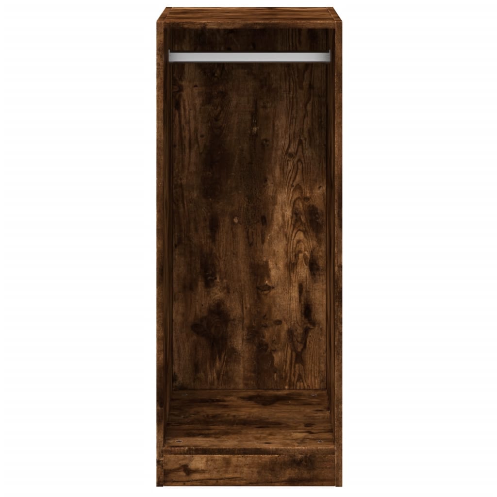 The tall narrow wardrobe with a hanging rail and shelf