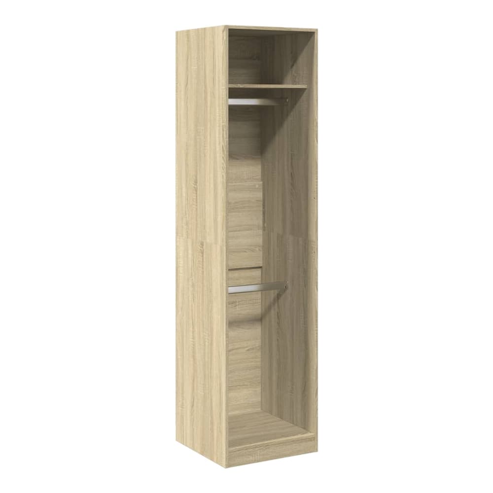 The open wardrobe interior with hanging rail and shelves