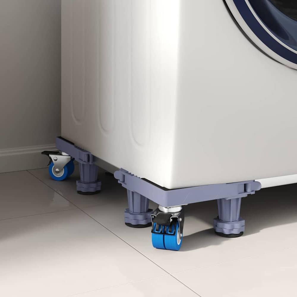 Close up of the washing machine base wheels and adjustable feet