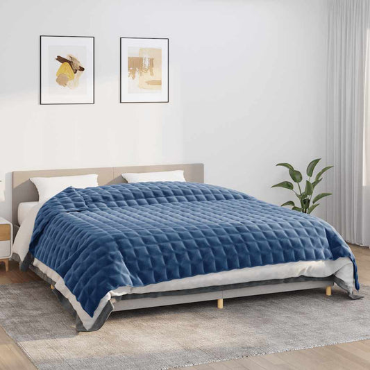 vidaXL Weighted Blanket Blue 15 kg laid out on a bed with white bedding