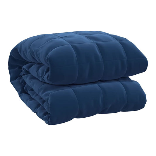 The blue weighted blanket folded neatly on a plain background
