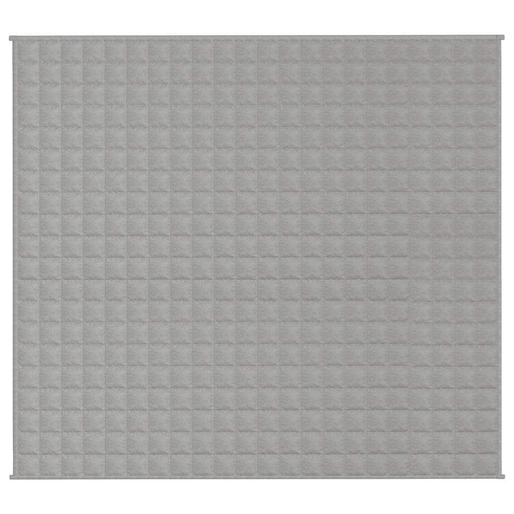 The grey weighted blanket laid out flat showing the square stitched pattern
