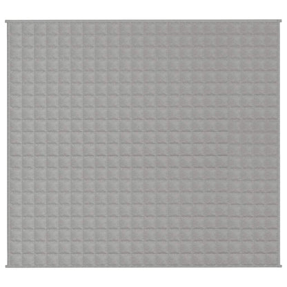 The grey weighted blanket laid out flat showing the square stitched pattern
