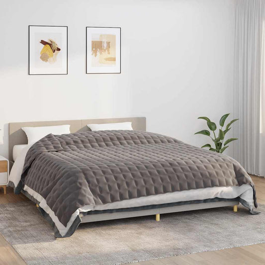vidaXL Weighted Blanket Grey 11 kg laid out on a bed with white bedding