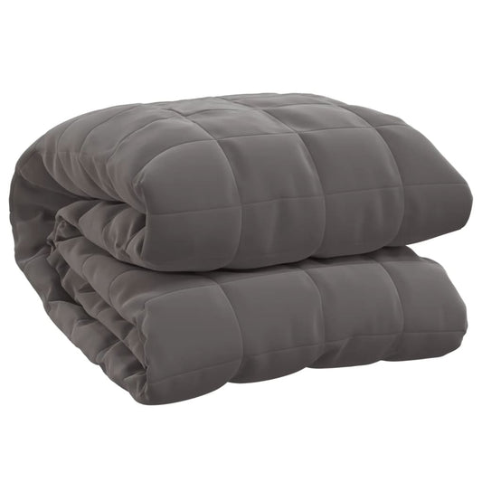 Folded grey weighted blanket showing its soft texture