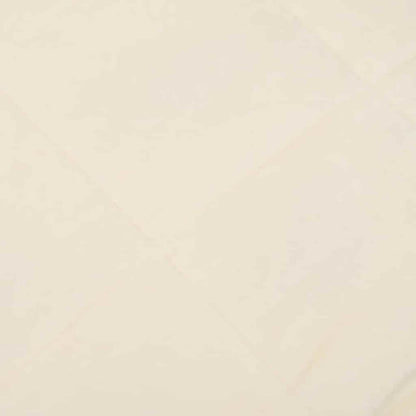 A close-up of the light cream fabric texture