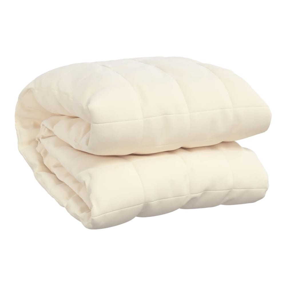 The folded weighted blanket in light cream fabric