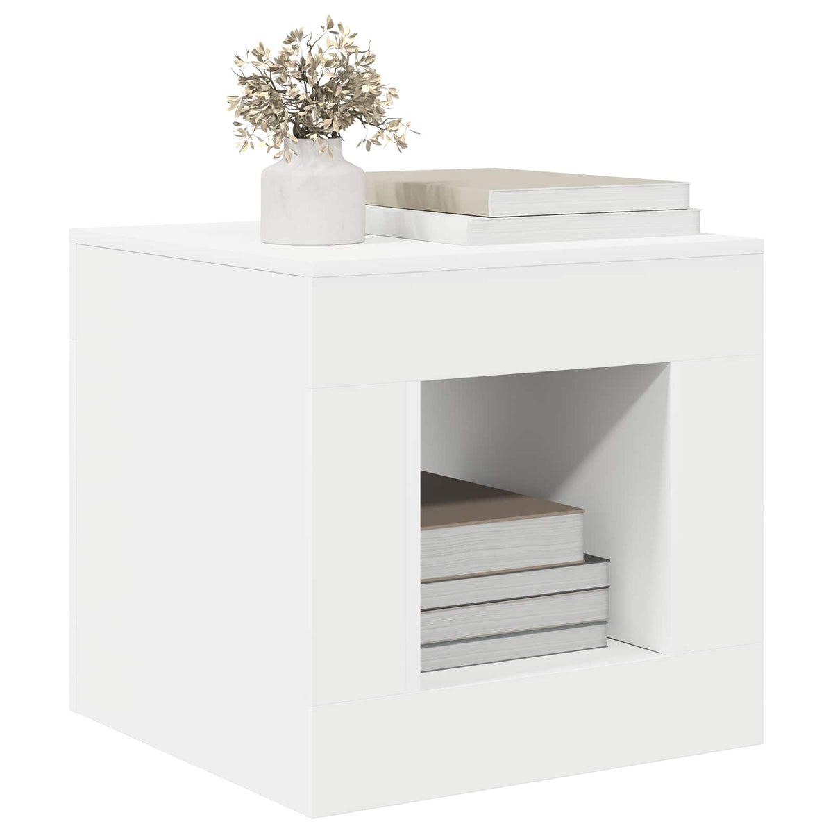 White coffee table with books stacked in the open cube