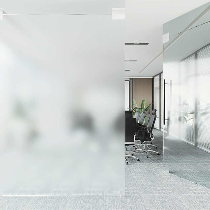 Frosted grey window film used to divide a modern office space