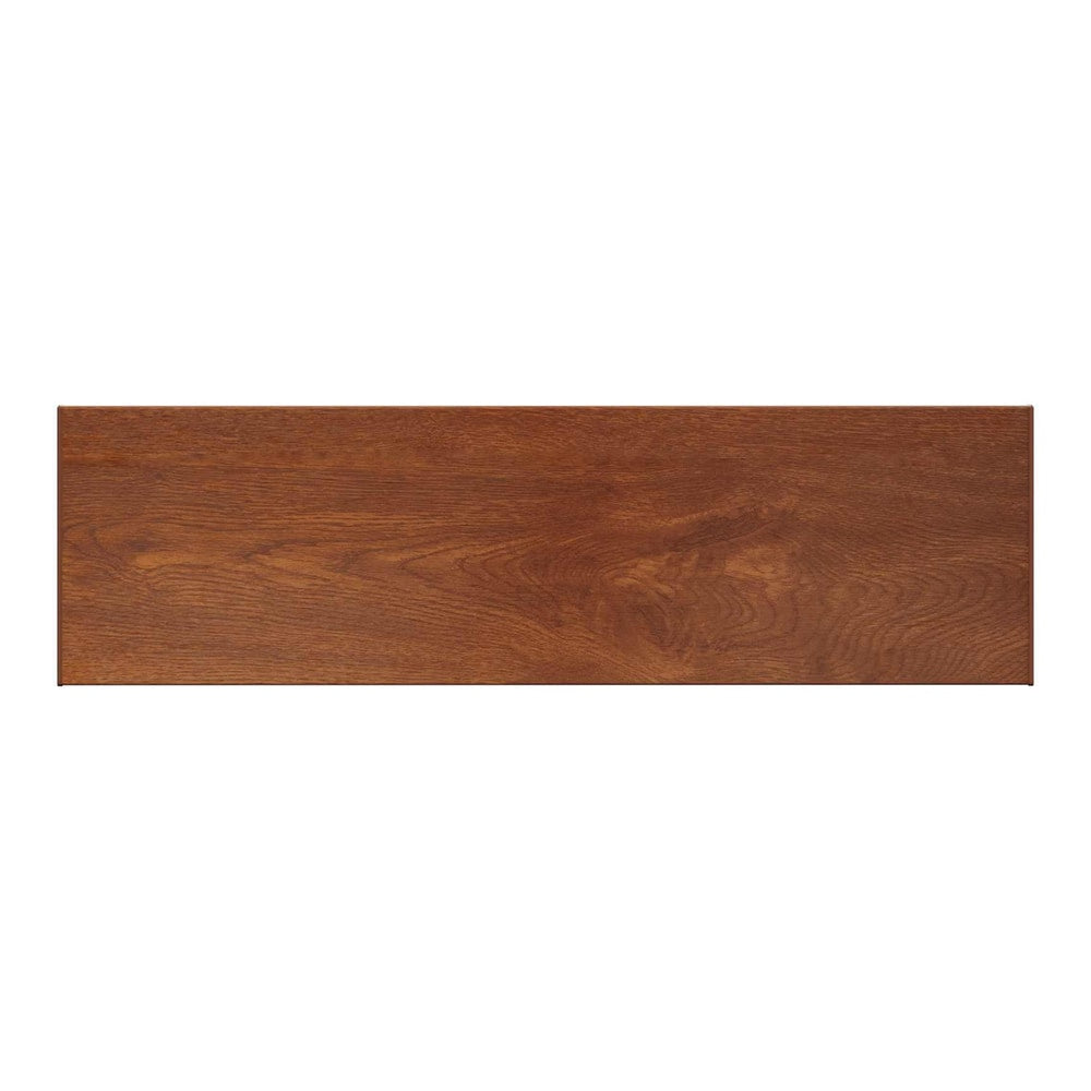 Close-up of the brown wood grain texture on the window sill