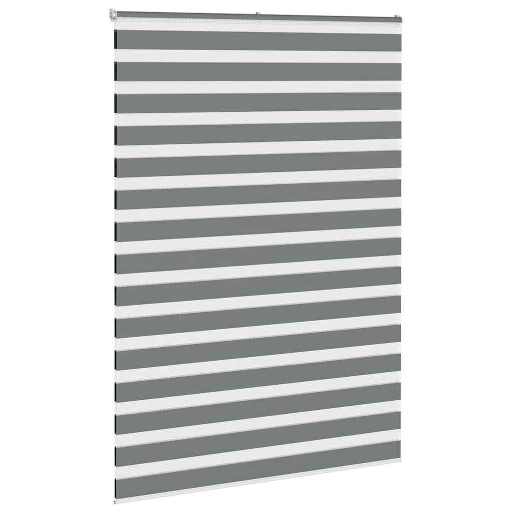 The dark grey zebra blind is shown from the side with its fabric rolled up
