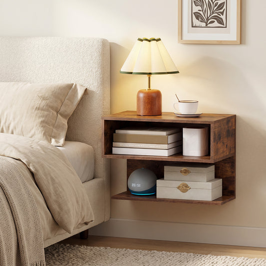 The wall mounted bedside table in a bedroom setting next to a bed