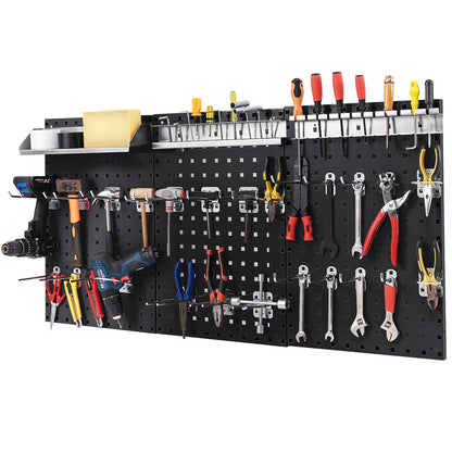 The metal pegboard panels fully loaded with a wide variety of workshop equipment