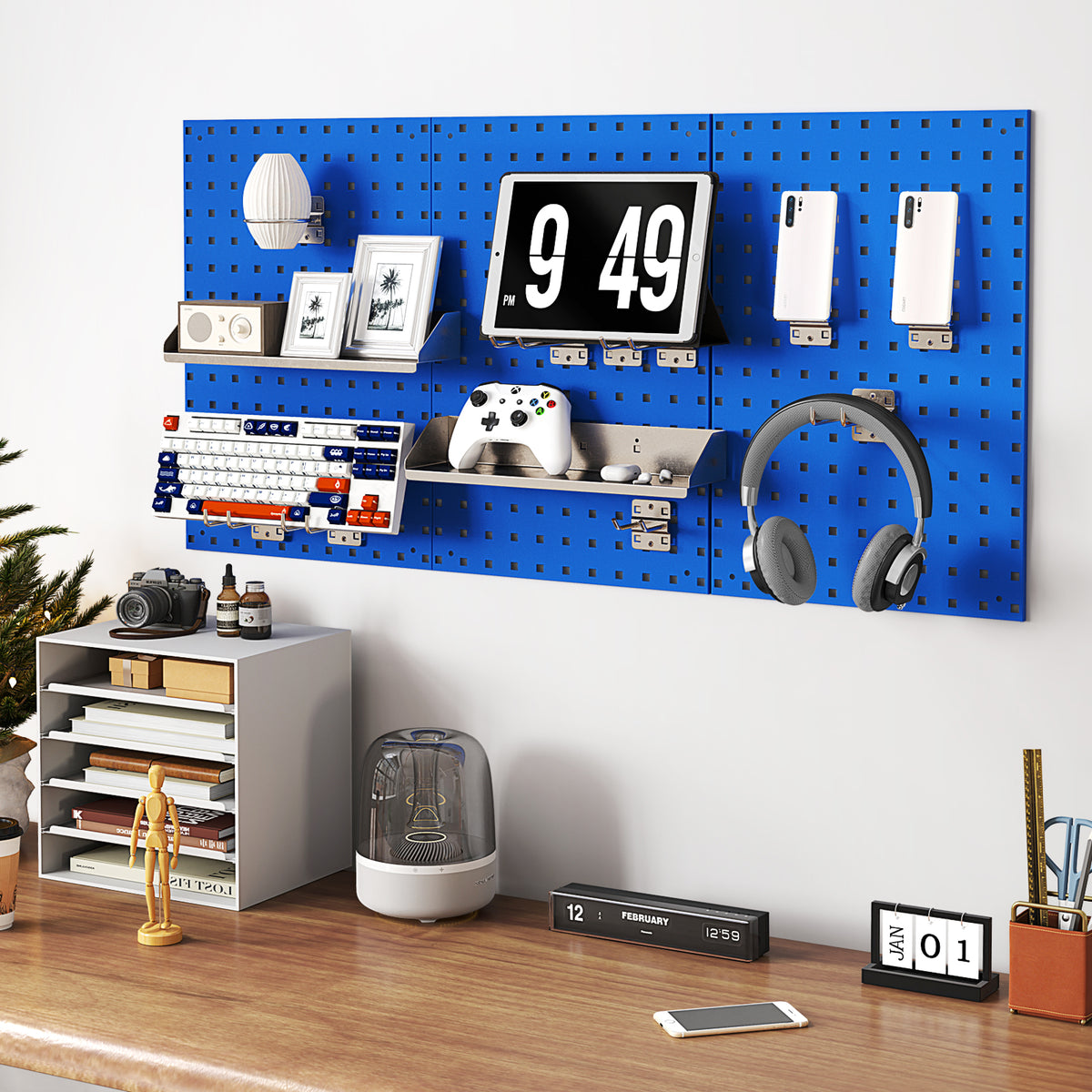The garages pegboard organiser shown in a home office setting with a keyboard, tablet and headphones