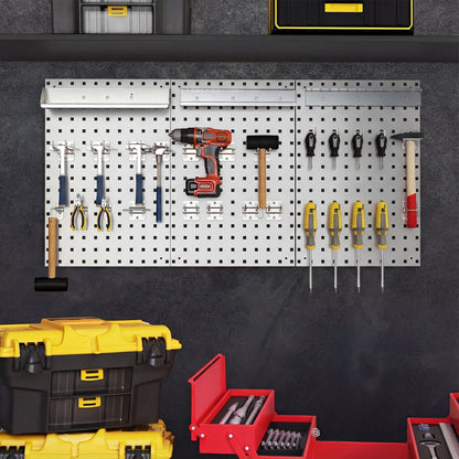 The garage storage system mounted on a dark wall with toolboxes placed below