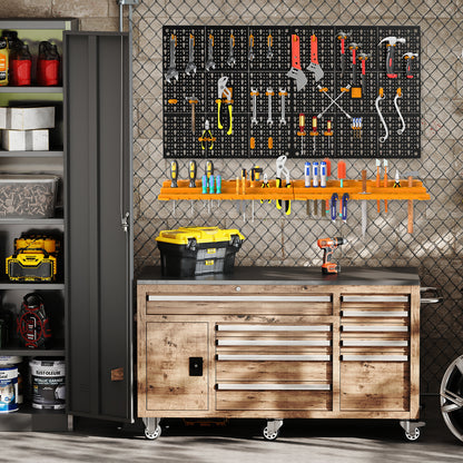 The garage storage organiser mounted on a wall above a workbench with tools and cabinets