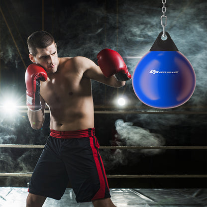 The blue water punching bag is being used in a boxing ring with a boxer