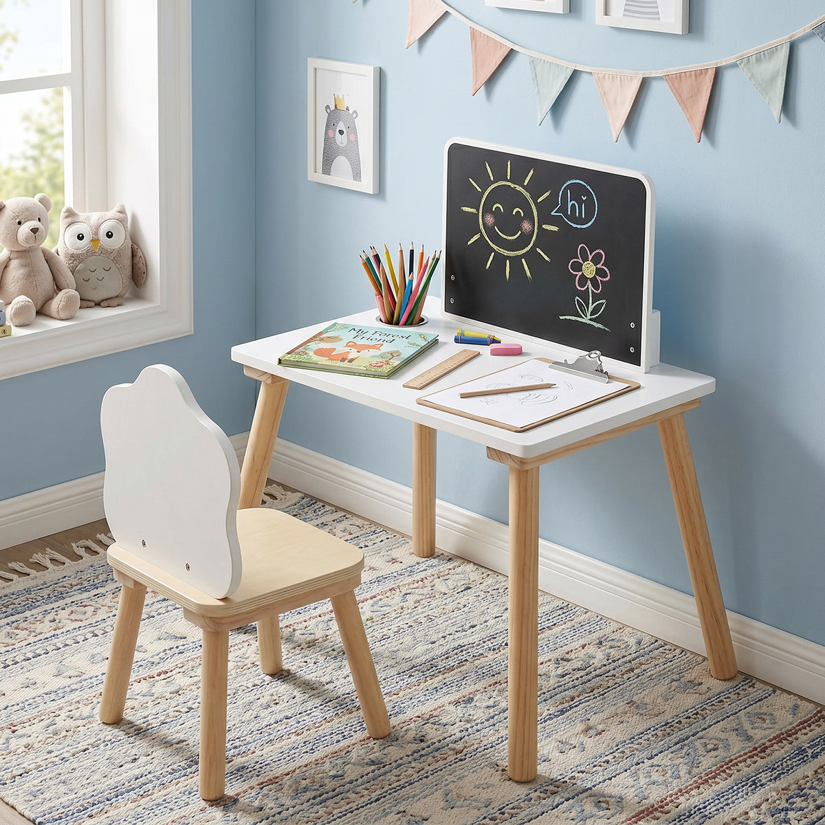 The kids table and chair set placed in a child bedroom with a rug and blue walls