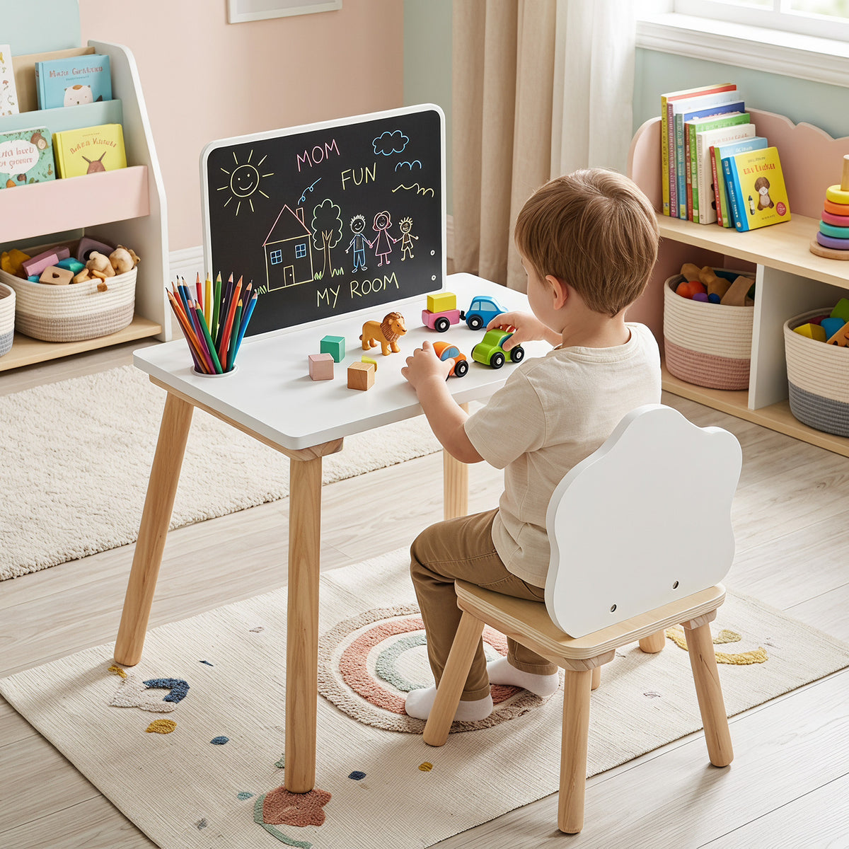 The kids table and chair set being used by a young child playing with toy cars