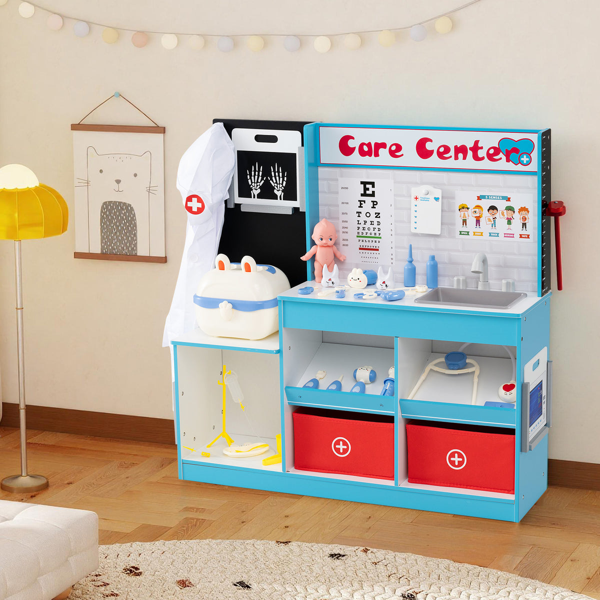 The blue and white playhouse medical center in a child's room setting