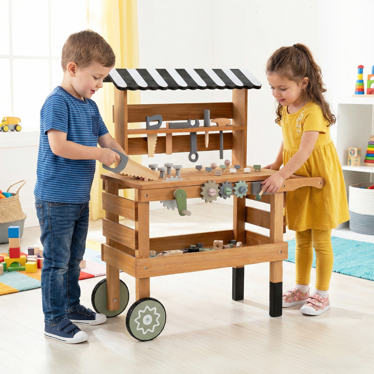 Two children playing with the wooden outdoor kids rolling cart