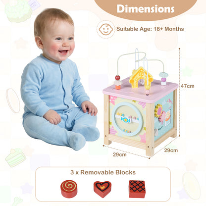 The learning toy with size labels and a baby sitting next to it