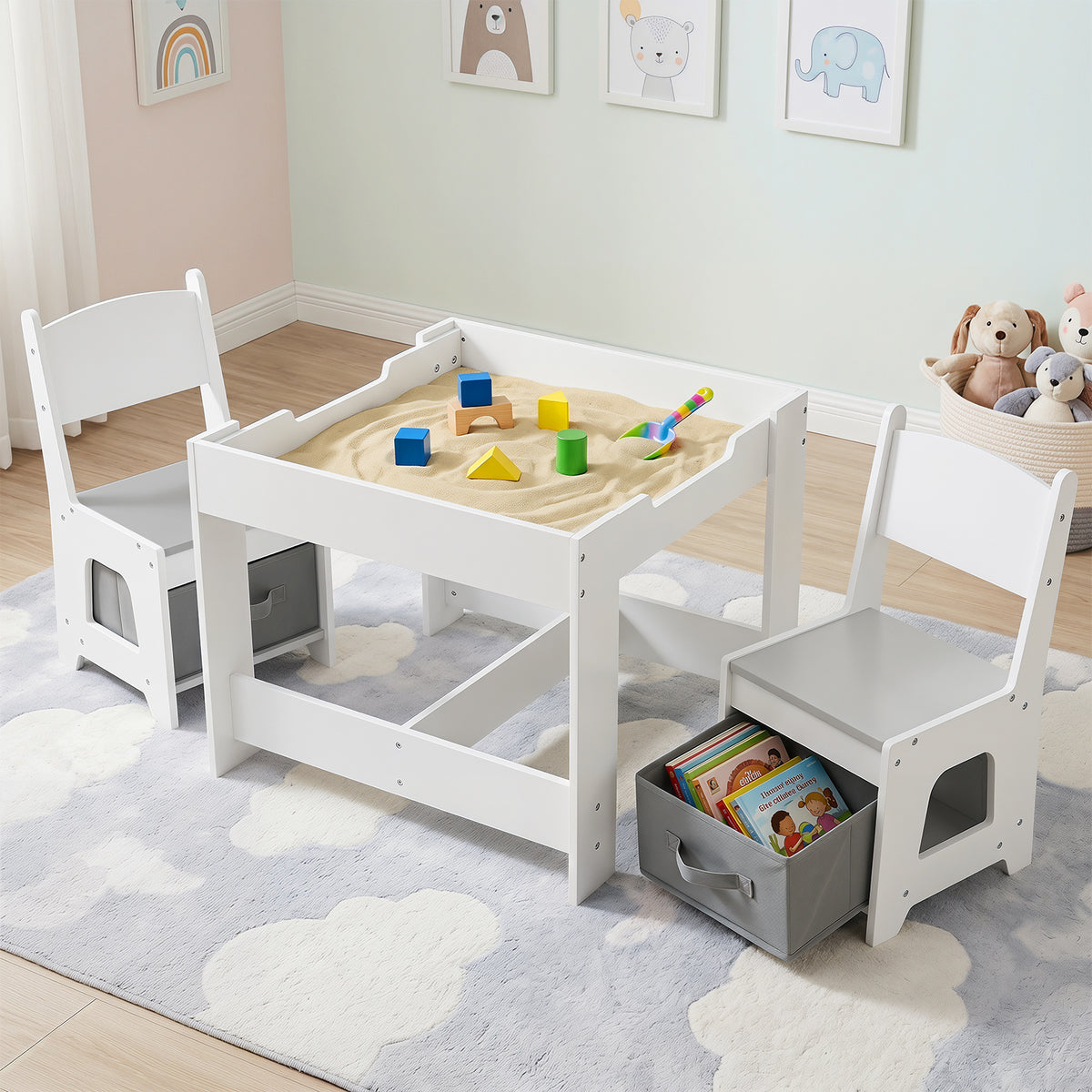 The kids table and chair set filled with sand for play in a child's bedroom