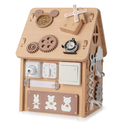 The learning toy showing the side panel with gears and a light switch