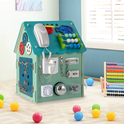 The learning toy standing on a carpeted floor surrounded by colourful plastic play balls