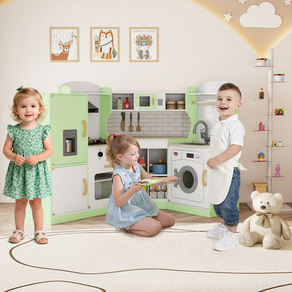 Two children playing with the green corner play kitchen set in a bright room