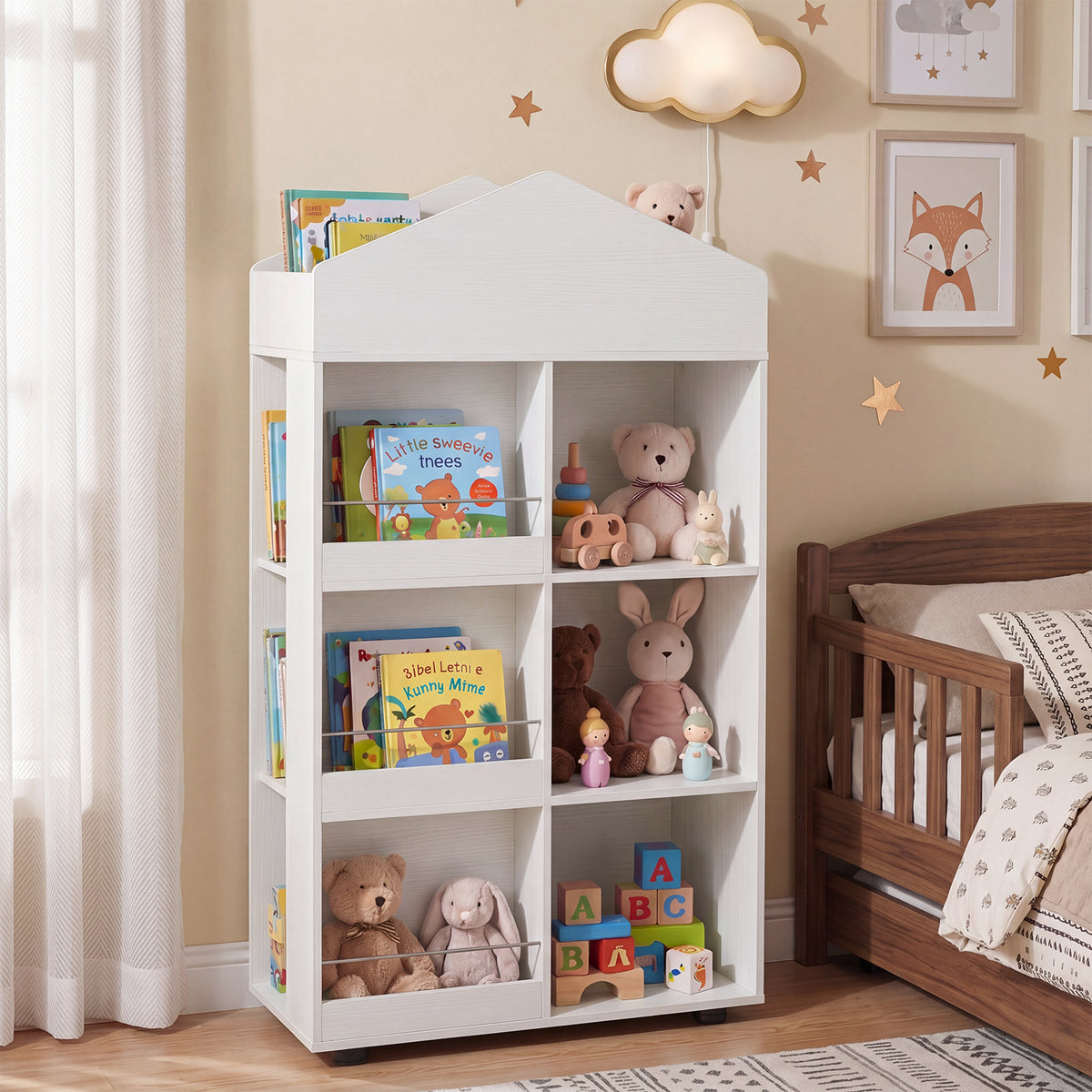 This white kids storage unit is filled with books and soft toys in a nursery setting