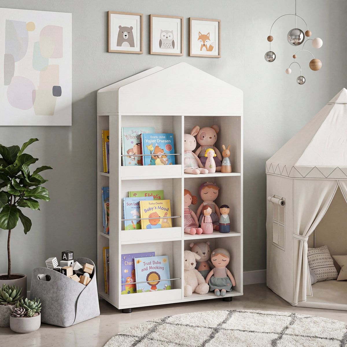 The white kids storage unit is shown in a child's bedroom with toys and books