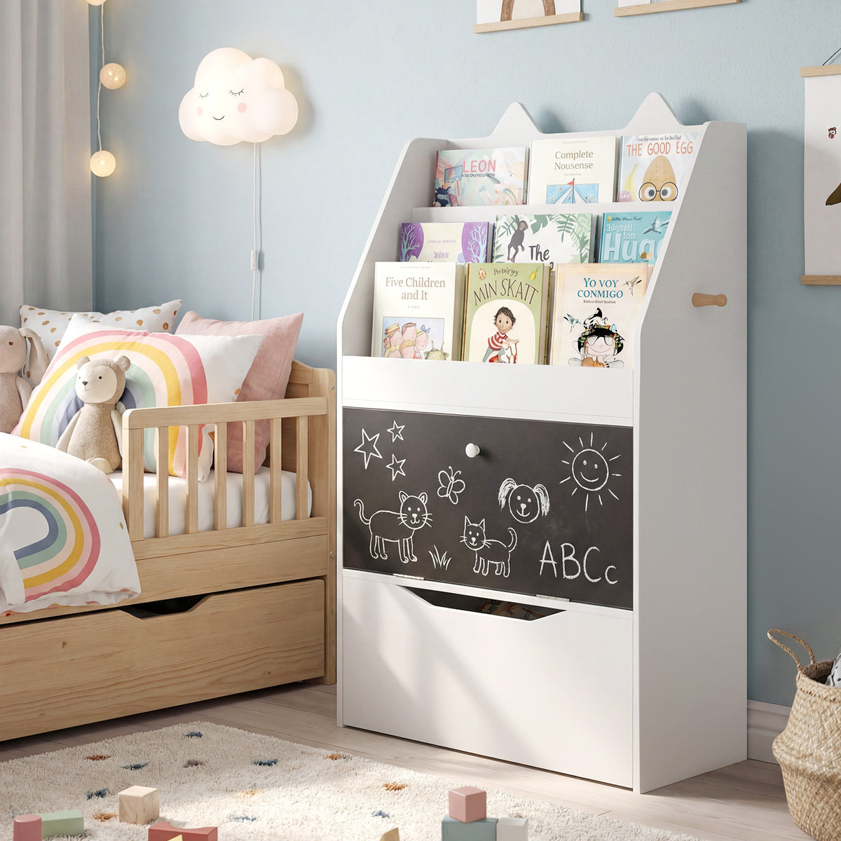 The kids storage unit filled with books, in a nursery with a bed and toys