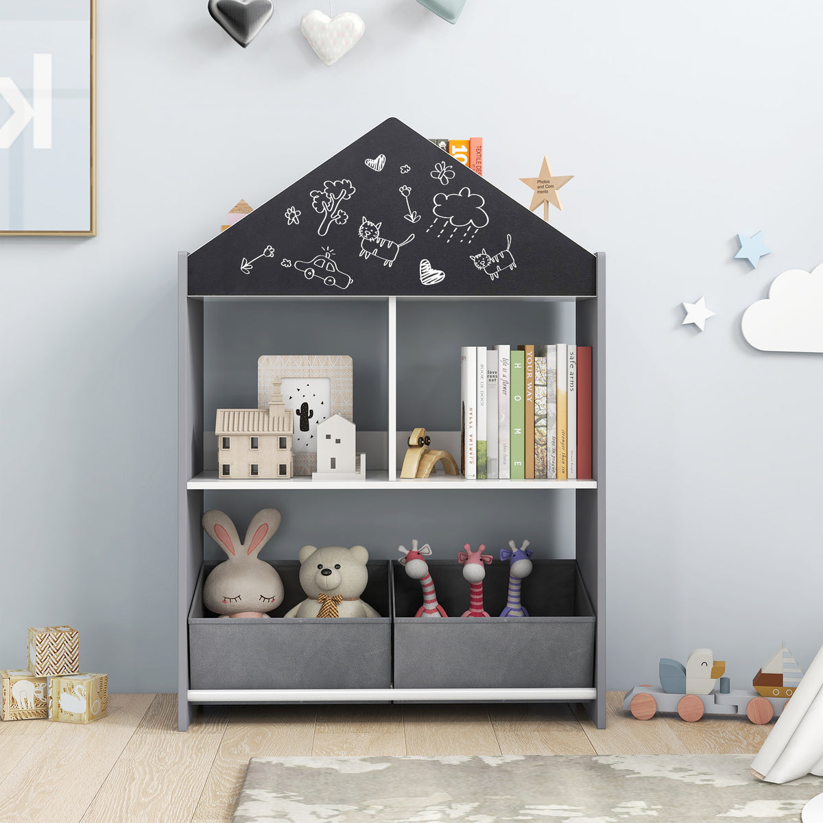 The kids storage unit filled with toys and books, showing the chalkboard roof with drawings