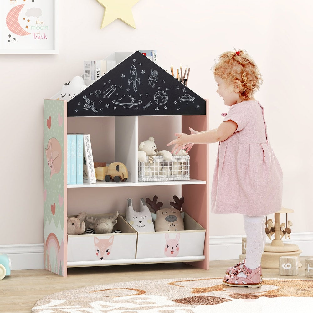 A young girl reaching for toys on the pink dollhouse bookshelf in a nursery