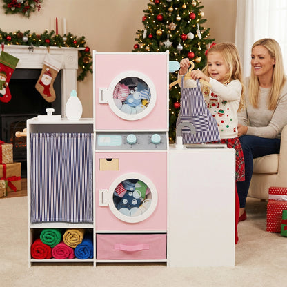 A mother and daughter playing with the pink toy washing machine in a festive room