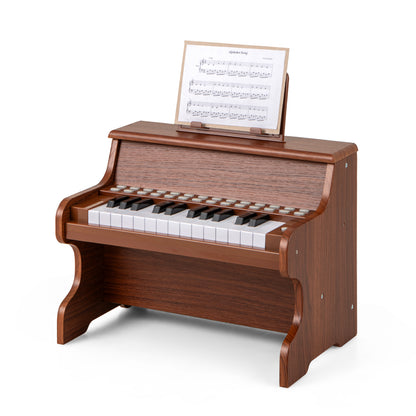 The wooden digital piano with a sheet of music placed on the integrated music stand